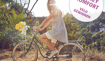 Frau auf Citybike